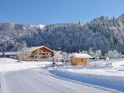 Familienhotel - Kirchdorf in Tirol - Das Schnee - Abenteuerland direkt vor dem Haus - Familotel Landgut Furtherwirt
