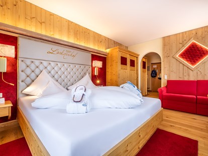 Familienhotel - Gosau - Unser beliebtes Herzogzimmer besticht durch eine angenehme Größe für Sie und Ihre Familie!  - Schlosshotel Lacknerhof****S Flachau
