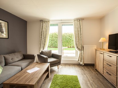 Familienhotel - Niedersachsen - Wohnbereich im Appartement - Frieslandstern - Ferienhof und Hotel