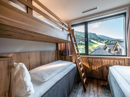 Familienhotel - Kirchdorf in Tirol - Kinderzimmer in der "Family Suite Deluxe Leogang" - Good Life Resort die Riederalm ****S