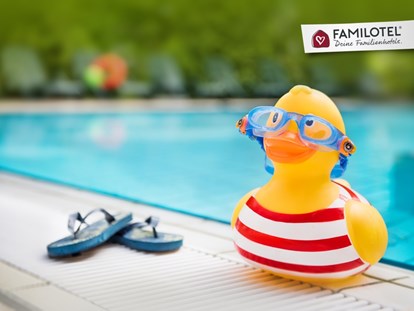 Familienhotel - Kinderbetreuung in Altersgruppen - Schwimmbad - Außenbecken - Hotel Sonnenhügel Familotel Rhön