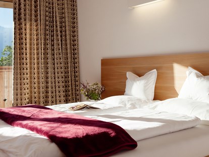 Familienhotel - Wellnessbereich - Zimmer mit Doppelbett - Der Stern - Das nachhaltige Familienhotel seit 1509