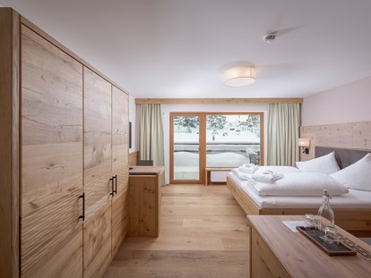 Familienhotel - Kirchdorf in Tirol - Zimmer Melisse mit 33 m²  - Naturhotel Kitzspitz