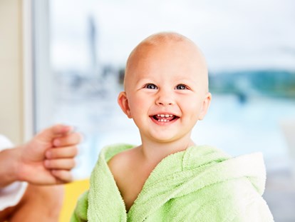 Familienhotel - Wellnessbereich - Glückliches Baby - AIGO welcome family