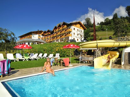 Familienhotel - Obertilliach - Außenpool mit Wasserrutsche: https://www.glocknerhof.at/hotel-mit-pool-und-wasserrutsche-in-kaernten.html - Hotel Glocknerhof
