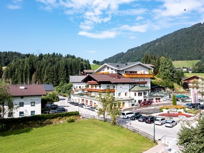 Familienhotel - Pools: Außenpool beheizt - Hotel Felsenhof in Flachau, SalzburgerLand - Hotel Felsenhof