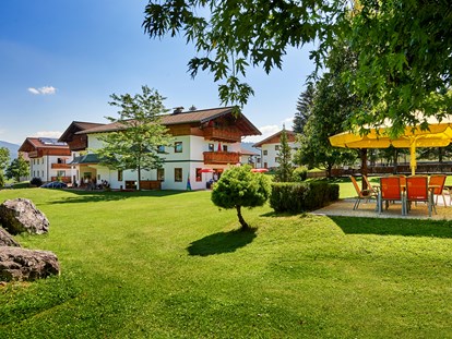 Familienhotel - Pools: Schwimmteich - Sonnberg Ferienanlage im Sommer - Sonnberg Ferienanlage