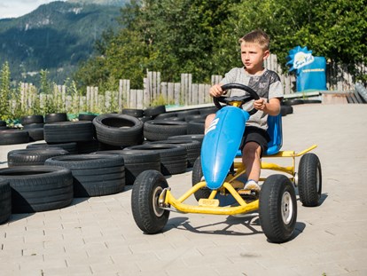 Familienhotel - Wellnessbereich - Die Go Carts sind der Hit! - Kinderhotel Laderhof