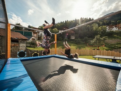 Familienhotel - Wellnessbereich - Action findet Ihr im trampolin - Kinderhotel Laderhof