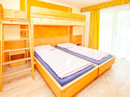 Familienhotel - Umgebungsschwerpunkt: Strand - Doppelzimmer Typ"Schneekönig" mit Etagenbett - Familienhotel Schneekönig