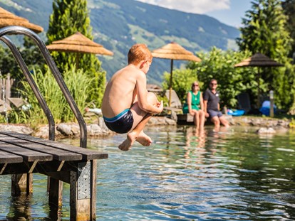 Familienhotel - Wellnessbereich - Badeteich - ein Highlight im Sommer - Alpin Family Resort Seetal