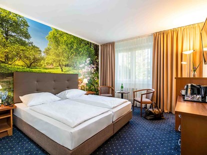 Familienhotel - Brandenburg - Suite Schlafbereich - AHORN Seehotel Templin