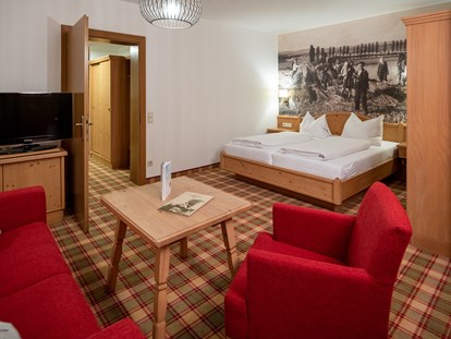 Familienhotel - Trebesing - Wohnbereich im Doppelzimmer - Familiengut Hotel Burgstaller