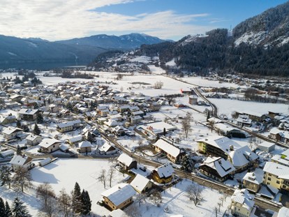Familienhotel - Trebesing - Luftaufnahme im Winter - Familiengut Hotel Burgstaller