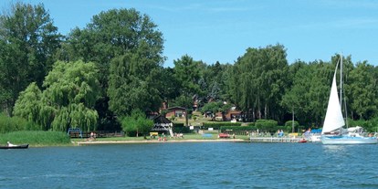 Familienhotel - Preisniveau: günstig - Ferienhäuser mit Blick auf den Plauer See - Ferienpark Heidenholz