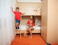 Kinderhotel: Zimmer mit Stockbett - Hotel Sonnenpark**** Superior