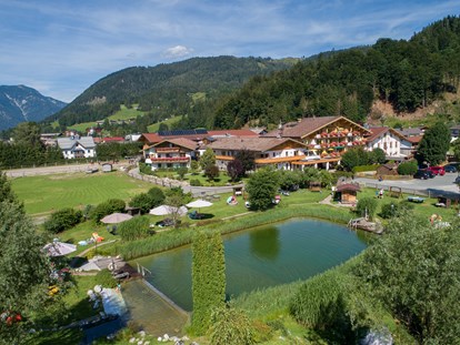 Familienhotel - Tirol - Furtherwirt mit Bio-Badeteich - Familotel Landgut Furtherwirt